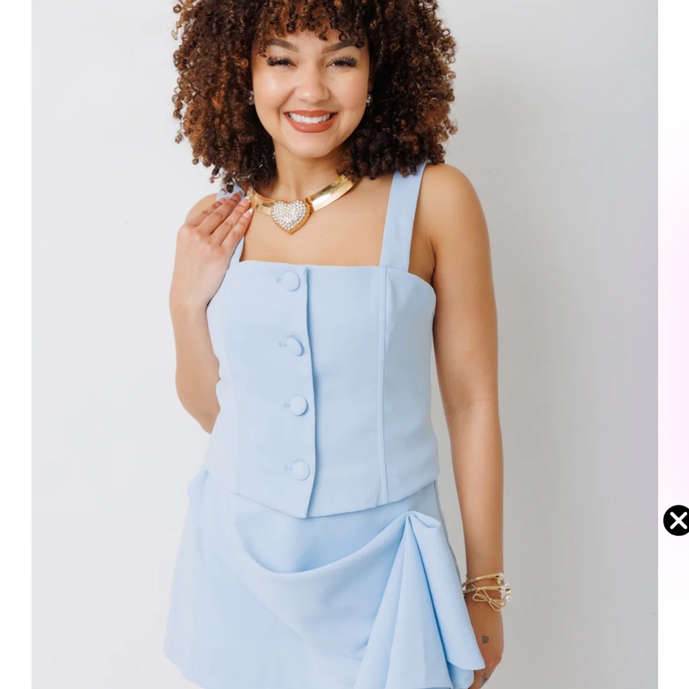 Light Blue Sleeveless Button-Up Top